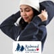 redwood classics, a picture of a woman wearing a hot with a hoodie